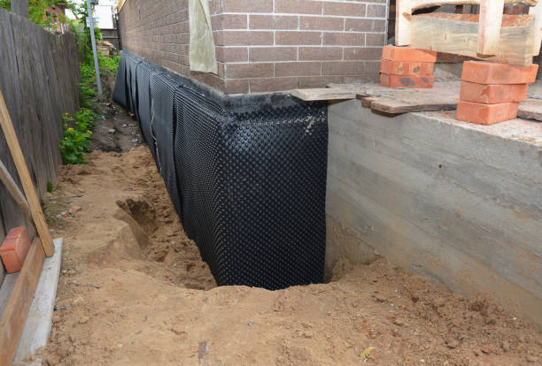 Happy homeowners after waterproofing job in Glenelg